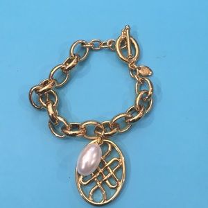 Brand new gold toned bracelet